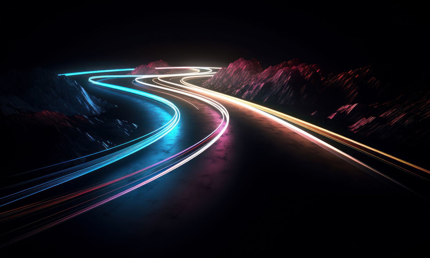 Blue, pink and yellow neon lit lines outline a windy road